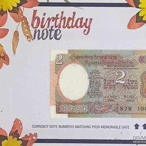 2 Rupees currency note matching your birthdate with birthday cover