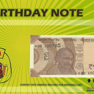 10 Rupees Currency Note with your birth-date and photo in a card packing