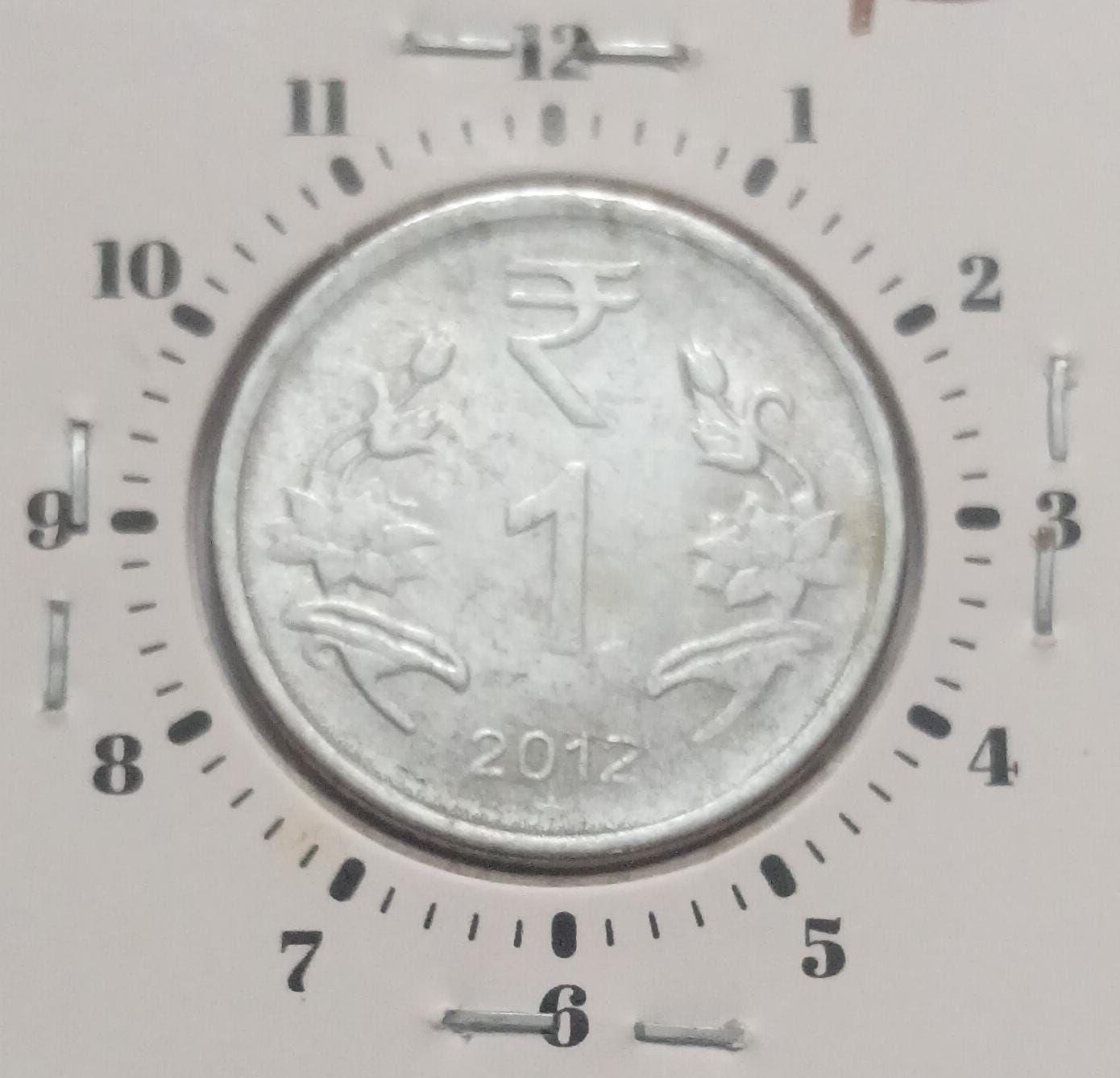 India - 2012 - 1 Rupee Hyderabad Mint 11 Oc - Error Coin