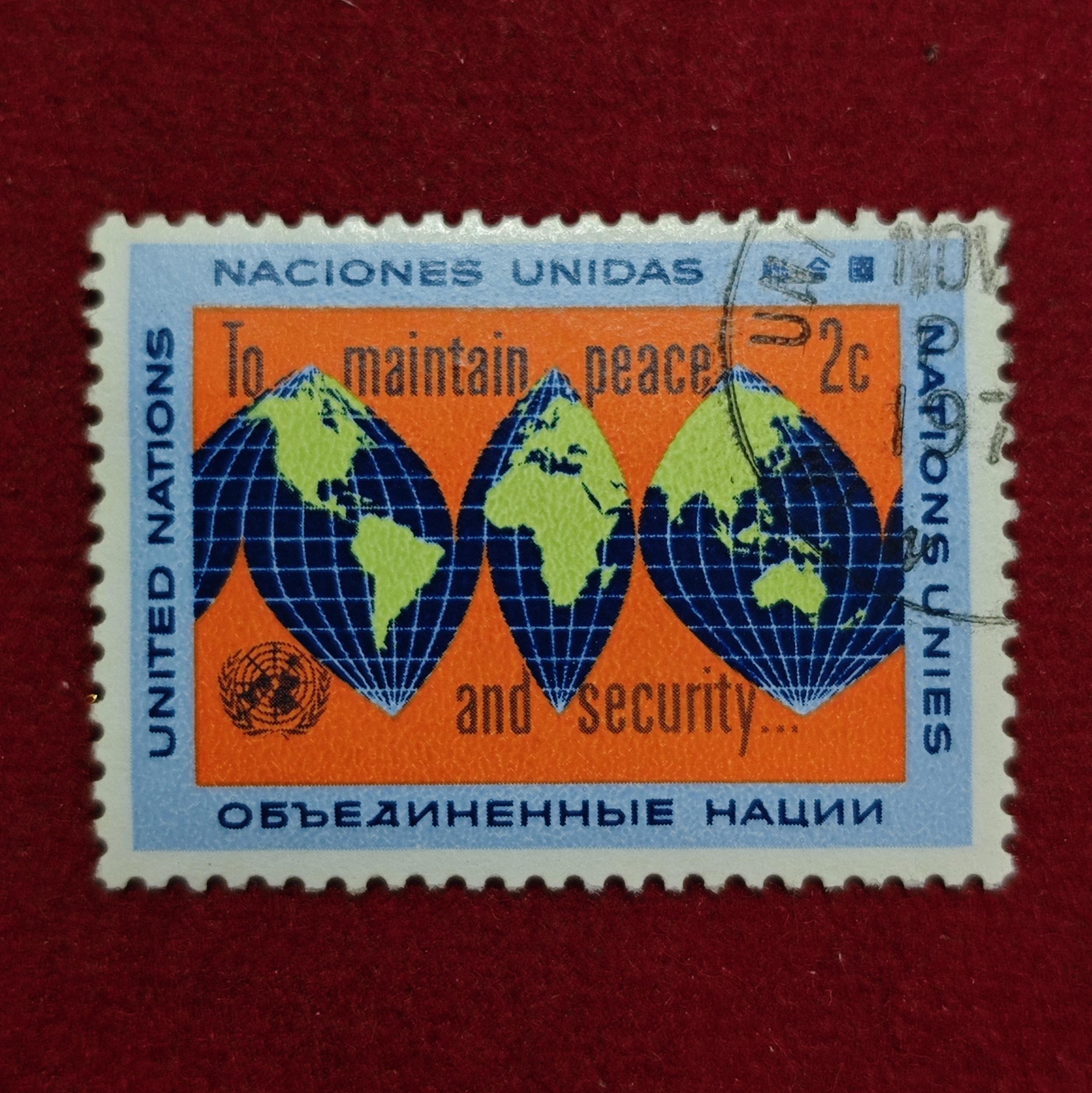 Stamp :- “United Nations 2¢ ‘To Maintain Peace and Security’ World Map Commemorative Stamp